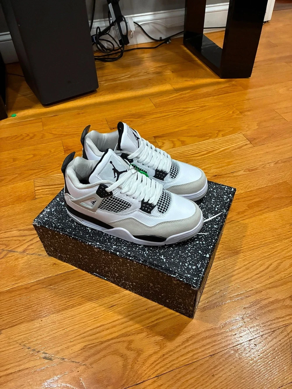 Jordan Retro 4 Men's Sneakers in White and Black with Gray Accents